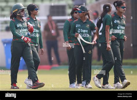 Bangladesh women cricket team Captain Nigar Sultana Joty (L) along teammates walk through as ...