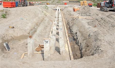 Concrete Piles Foundation for a New Building on Construction Site Stock Photo - Image of support ...