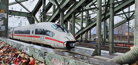 ICE train crossing the Hohenzollernbrücke in Cologne, Germany. : r/trains