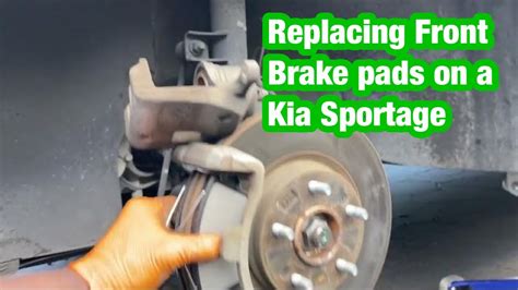 kia sportage front brake pads installation - YouTube