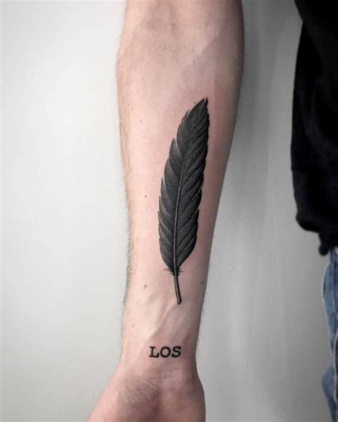 Fine black feather tattoo - Tattoogrid.net