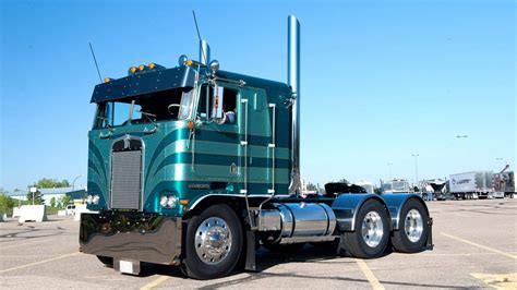 Download Kenworth Metallic Green Truck Wallpaper | Wallpapers.com