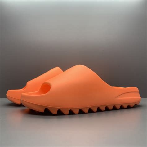 Yeezy Slides 'Enflame Orange' - SneakerCool.com