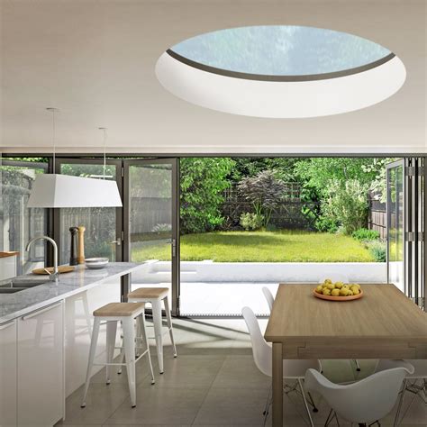 This round skylight design will help to make your rooflight kitchen extension truly unique ...