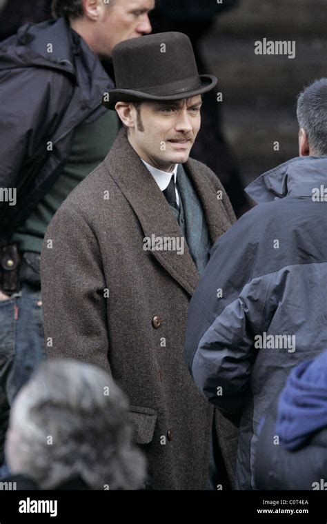 Jude Law filming on the set of Sherlock Holmes London, England - 21.12. ...