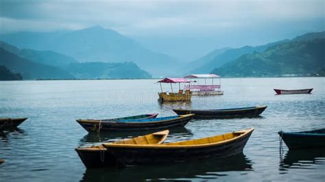 Boats on Phewa lake, Nepal stock image. Image of kayak - 109825655