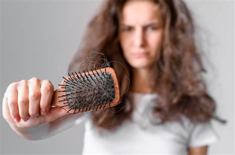 Premium Photo | Female with tangled hair and brush