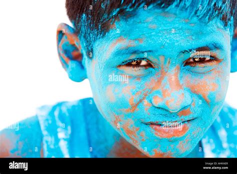 Indian boy covered in blue powder. India Stock Photo - Alamy