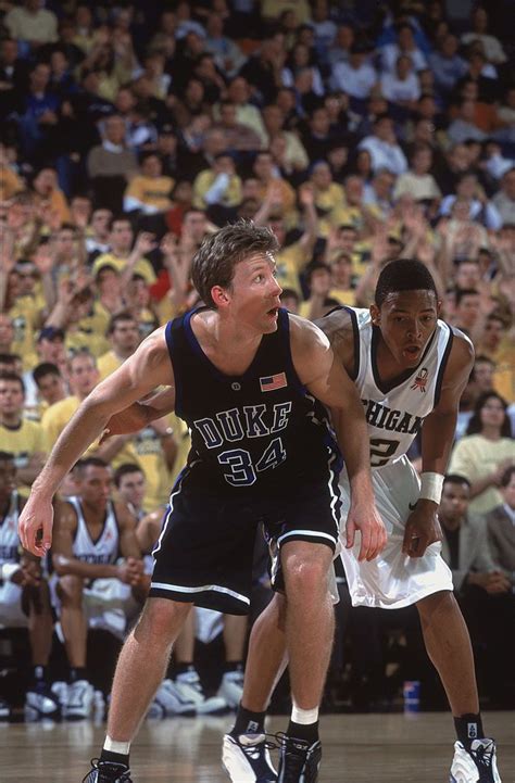 Guard Mike Dunleavy of the Duke Blue Devils boxes out forward Chuck ...