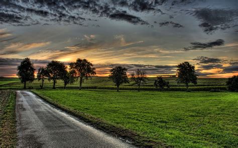 Country road at sunset wallpaper | Country roads, Country sunset, Magical places