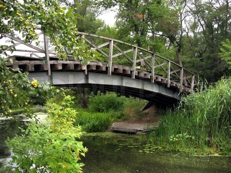 Large wooden bridge over the river, ... | Stock image | Colourbox