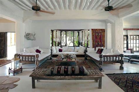 Baithak style living room with white waged walls and red accents Indian Living Rooms, New Living ...