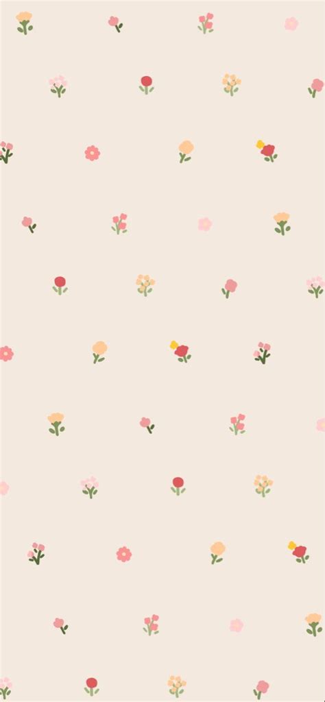 a pink wallpaper with small flowers on it