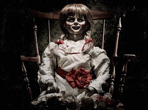 Download The Conjuring Smiling Annabelle Doll Wallpaper | Wallpapers.com