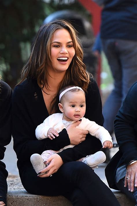 Chrissy Teigen and Daughter Luna’s First Family Portrait with Santa Includes a Stand-In John ...