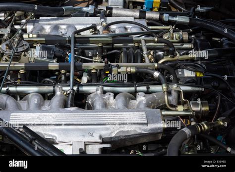 The engine compartment (engine) of a Jaguar XJS V12, 1989. 27th Oldtimer Day Berlin ...