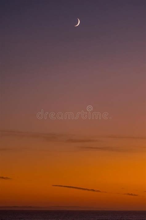 Sunrise Over the Indian Ocean at Struisbaai with Moon Visible Stock ...