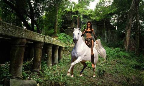 jungle girl exploring the ancient ruins while riding her beautiful white horse - Jungle Girls ...