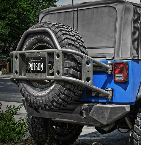 Arriba 71+ imagen jeep wrangler jk tire carrier - Thptnganamst.edu.vn