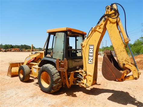 JOHN DEERE 310SE Backhoe - J.M. Wood Auction Company, Inc.