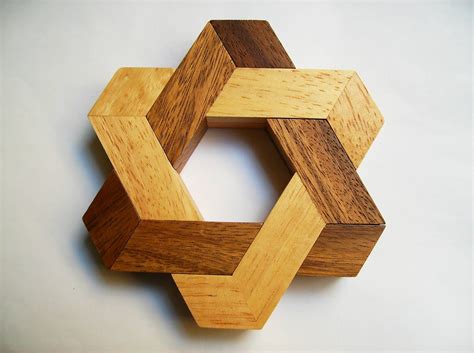 free wooden puzzle box plans | Wood wall art diy, Wood puzzles, Wooden puzzles