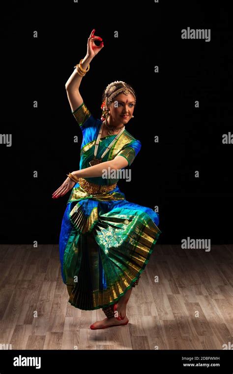 Young beautiful woman dancer exponent of Indian classical dance ...