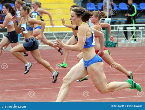 Athlets Compete in 100 Meters Race Editorial Stock Image - Image of adult, emotions: 25447384