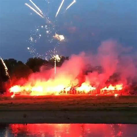 Dynamo Dresden fans welcome players back to action with firework display outside their team ...