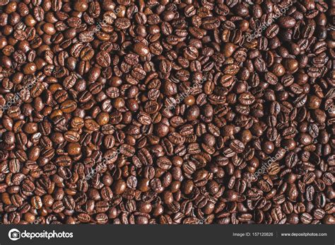 Roasted aromatic brown coffee beans — Stock Photo © KostyaKlimenko ...