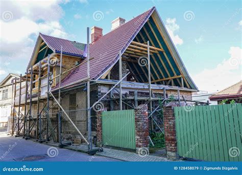 Complete Reconstruction of Old Wooden House in City Stock Image - Image ...