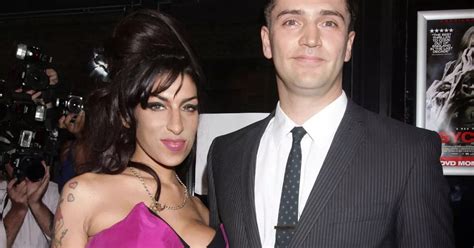 Amy Winehouse fiance Reg Traviss furious after being CUT from 'misleading' biopic of her life ...