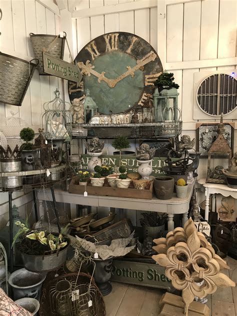 Garden decor summer barn sale event | Vintage store displays, Antique booth displays, Creative ...