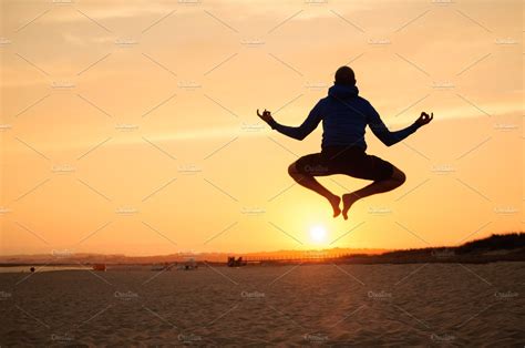 Man silhouette jumping at sunset stock photo containing sunset and man | High-Quality People ...