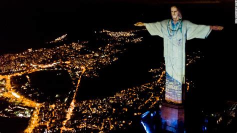 See Rio's Christ the Redeemer statue lit up as a doctor - CNN Video