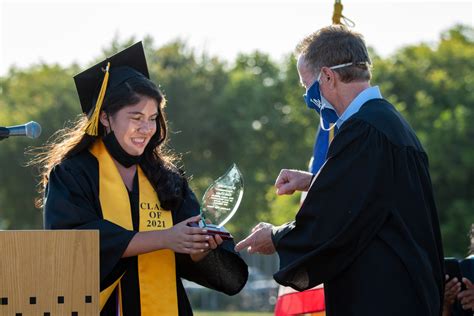 Panorama High waves goodbye to class of 2021 at in-person graduation - LA Times Now