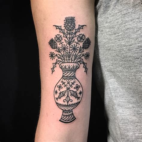 Black ornamental vase with flowers tattoo - Tattoogrid.net