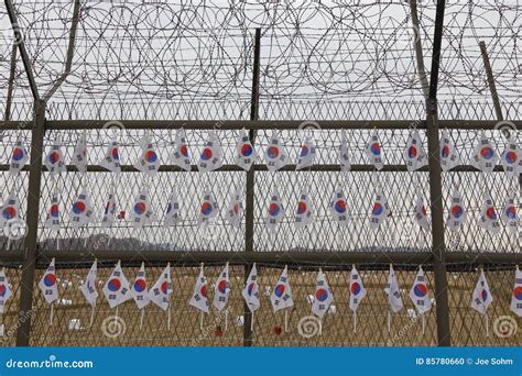 Barbed Wire Fence Separates South from North Korea - South Korean Flags Attached To Fence - Asia ...