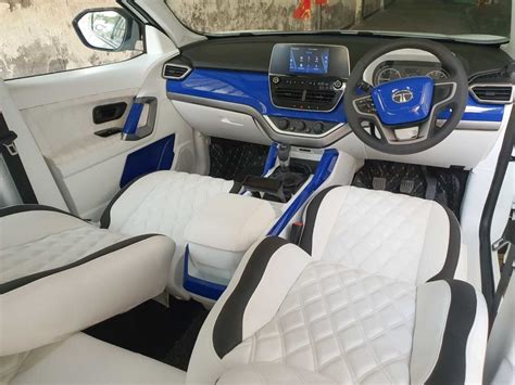 Tata Harrier Tastefully Customised With White & Blue Interiors