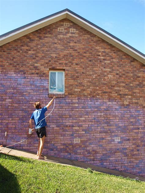 Painting the exterior brick walls of our home | Glamour Coastal Living