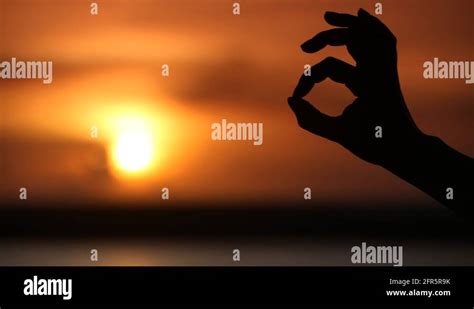 Ok hand sign silhouette Stock Video Footage - Alamy