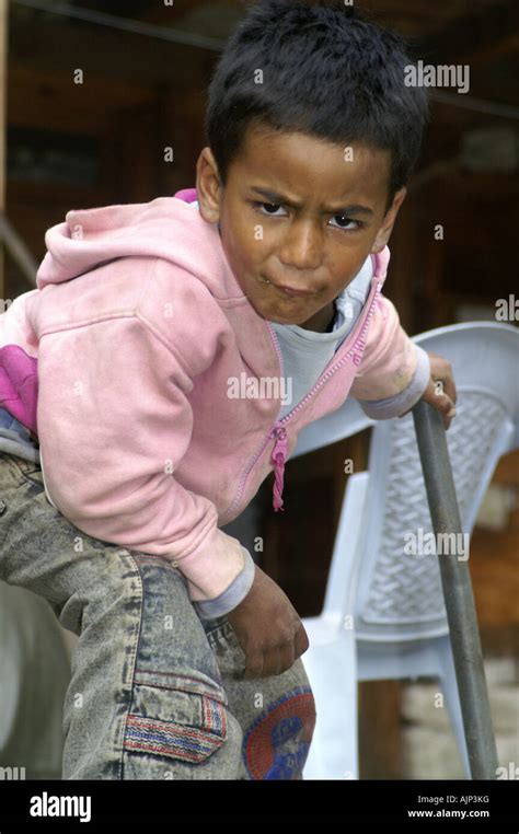 Young indian boy making funny faces pretending to be a policeman. India Stock Photo - Alamy