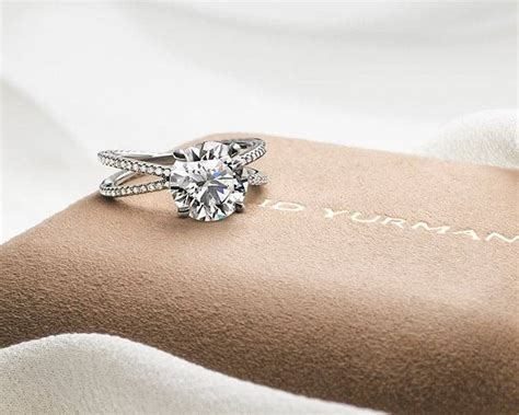 David Yurman Diamond Ring on tan packaging.