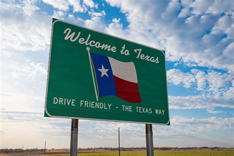 Welcome to Texas road sign in front of cloudy sky - Busy Being Jennifer