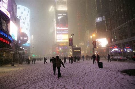 Times Square during a snowstorm: hunker down and throw some snowballs ...