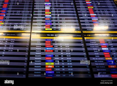 Bogota, Colombia - January 8, 2023: Front view of arrivals and departures screen at El Dorado ...