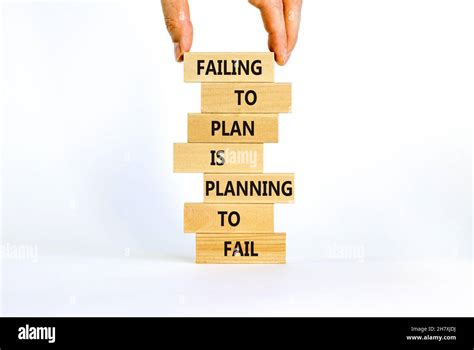 Failing to plan or planning fail symbol. Wooden blocks with words ...