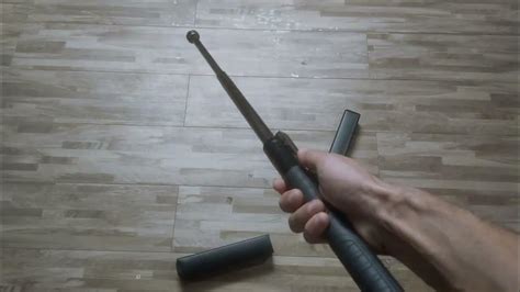 Tactical Extendable Automatic Telescopic Self Defense Stick - YouTube