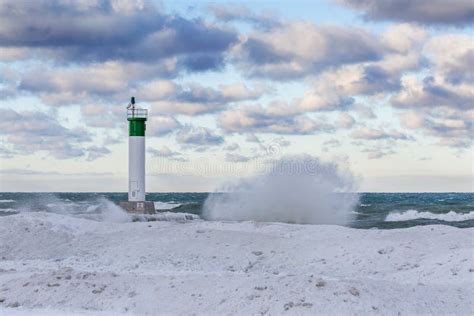 Lake Huron Lighthouse in Winter - Grand Bend, Ontario Stock Photo - Image of morning, water ...