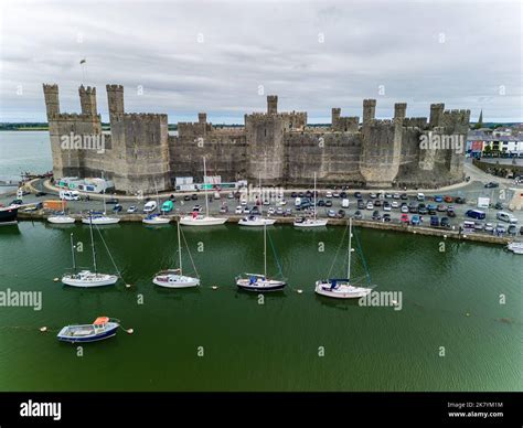 Aerial view of the ancient Caernarfon Castle in North Wales Stock Photo ...