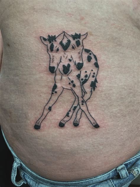 Two headed foal by Emily at Emily Alder Woods Tattoos in Goderich, Ontario, Canada : r/tattoos